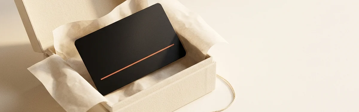 The Apoorv Card — a matte black metal health card in an open cream gift box, ready to gift